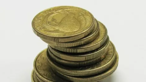 NZ dollar falls after RBNZ looks for ways to curb residential property investment